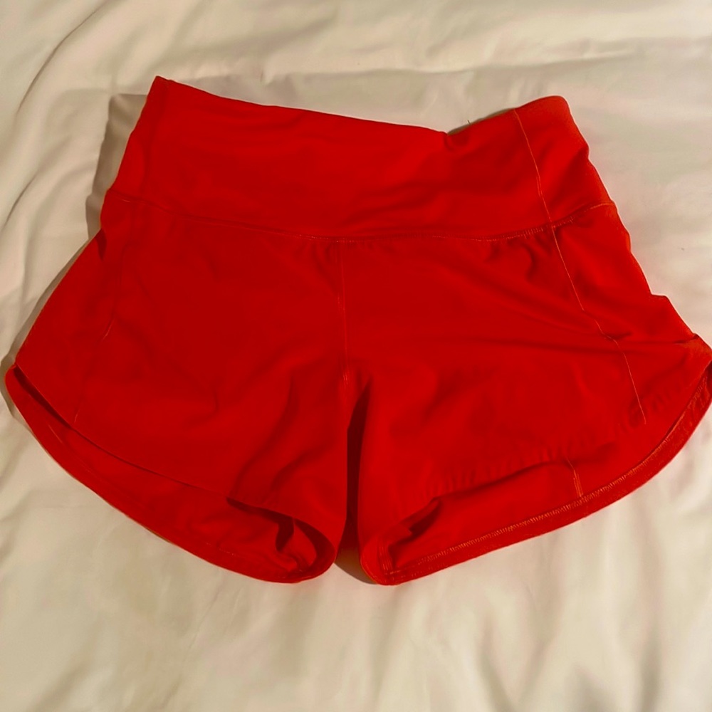 Lululemon speed up shorts. Carnation red. Size 4. Very good condition.